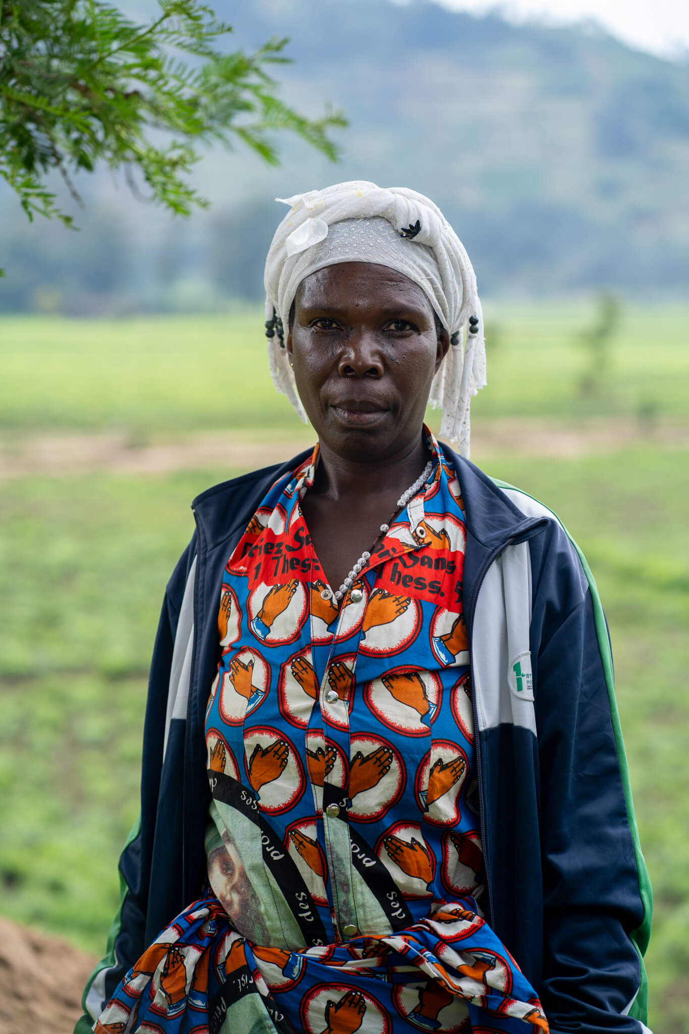 Portrait of Murekatete Consilien, 59, Treasurer at Twisungane VSLA group at Pfunda Tea Estate, Rubavu, Rwanda.. Image: Documenting Afrika/ETP