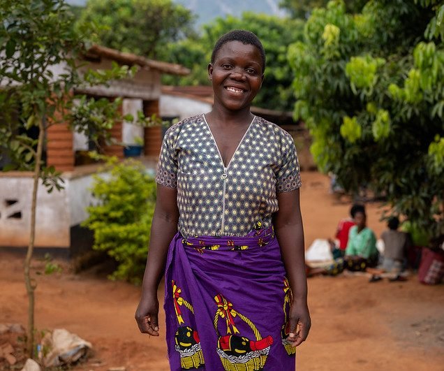A potrait of Dorica Richard. Dorica is a member of Tadala Nutrition Club where she learned new cooking skills to prepare nutritious food for her family, and good hygiene practices. Location: Mulanje, Malawi. Credit: ETP/Homeline Media